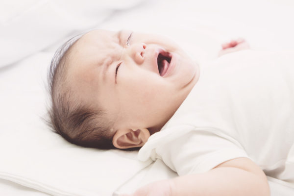 why does my baby wake up crying?