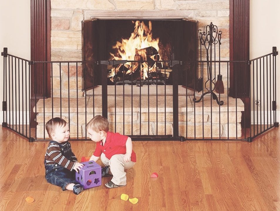 The fireplace is one of the most dangerous parts of the house for a mobile toddler. Here