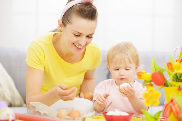 baby eating an egg