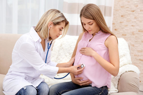woman at her first prenatal appointment