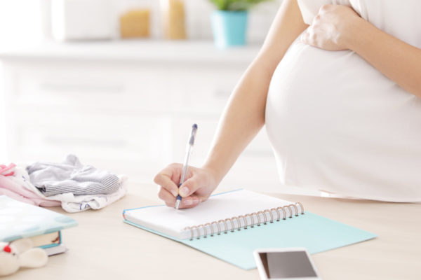 pregnant woman doing research on epidurals